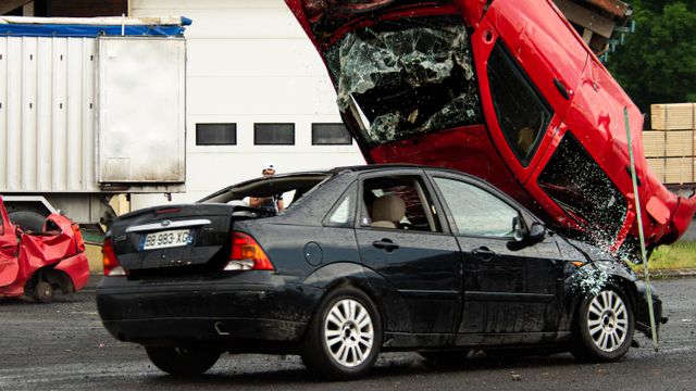 Car accident lawyer in Bakersfield at the scene of a two-vehicle crash on a Kern County road