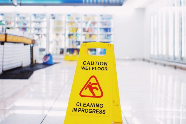 A wet floor left in a store aisle is the kind of hazard a premises liability lawyer in Bakersfield investigates. Madrigal Law proves the owner knew about the danger, preserves the security video, and pursues compensation for your injuries. Premises liability lawyer in Bakersfield reviewing a caution wet floor hazard in a store aisle